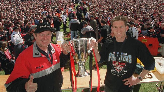 Coach Kevin Sheedy and captain James Hird with the 2000 premiership cup at Essendon's family day at Windy Hill.