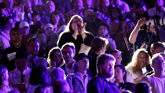 “Nina” seen protesting after the men’s final. (Photo by Martin KEEP / AFP)