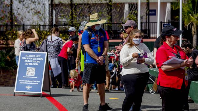 People lining up outside Dreamworld before the gates opened. Picture: Jerad Williams