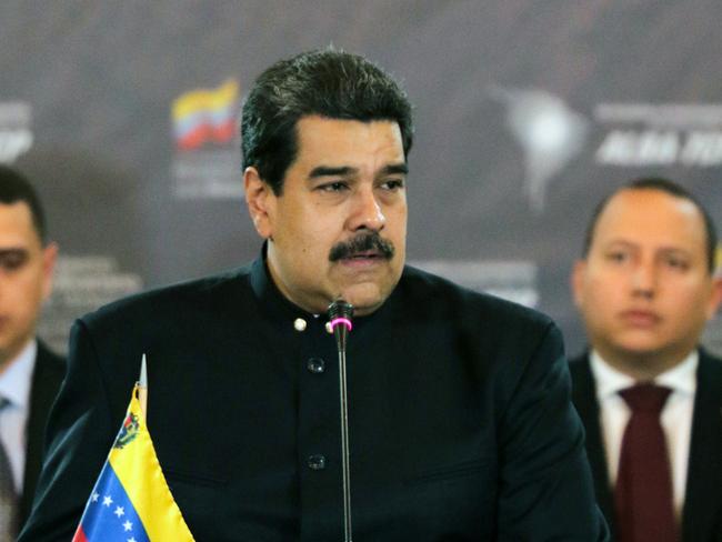 Venezuelan President Nicolas Maduro speaks during an extraordinary meeting of the Bolivarian Alliance for the Peoples of Our America-Peoples Trade Agreement (ALBA-TCP), in Caracas on January 12, 2018. / AFP PHOTO / Venezuelan Presidency / HO / RESTRICTED TO EDITORIAL USE-MANDATORY CREDIT "AFP PHOTO/VENEZUELAN PRESIDENCY/HO" NO MARKETING NO ADVERTISING CAMPAIGNS-DISTRIBUTED AS A SERVICE TO CLIENTS-GETTY OUT