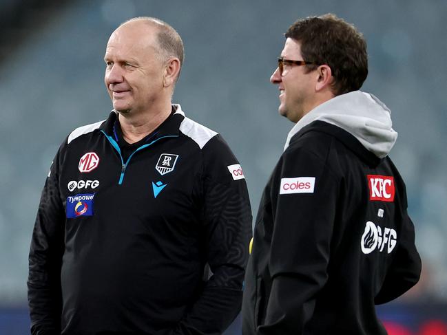 MELBOURNE, AUSTRALIA - AUGUST 10: Chad Cornes, Forwards Coach of the Power, Ken Hinkley, Senior Coach of the Power and Josh Carr, Midfield Coach of the Power look on prior to the round 22 AFL match between Melbourne Demons and Port Adelaide Power at Melbourne Cricket Ground, on August 10, 2024, in Melbourne, Australia. (Photo by Josh Chadwick/Getty Images)