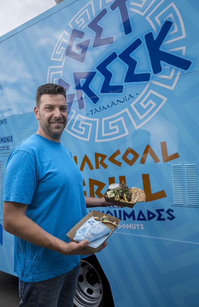 Mihali Karagiannis with Lamb souvlaki and charcoal-grilled lamb kalamaki (skewers) with pita, chips and Greek salad from Greek Food Truck. Picture: Caroline Tan