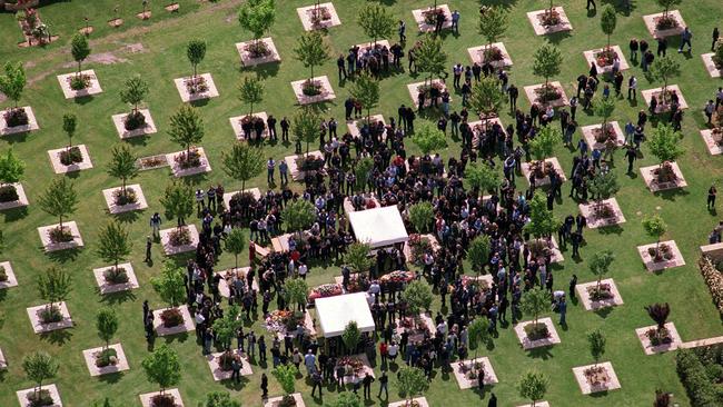 Aerial view of a classic large funeral for Rebels Hubert Western and Graham Nixon.