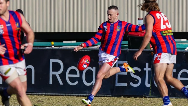 Billy Hartung takes a kick for Rye. Picture Al Dillon