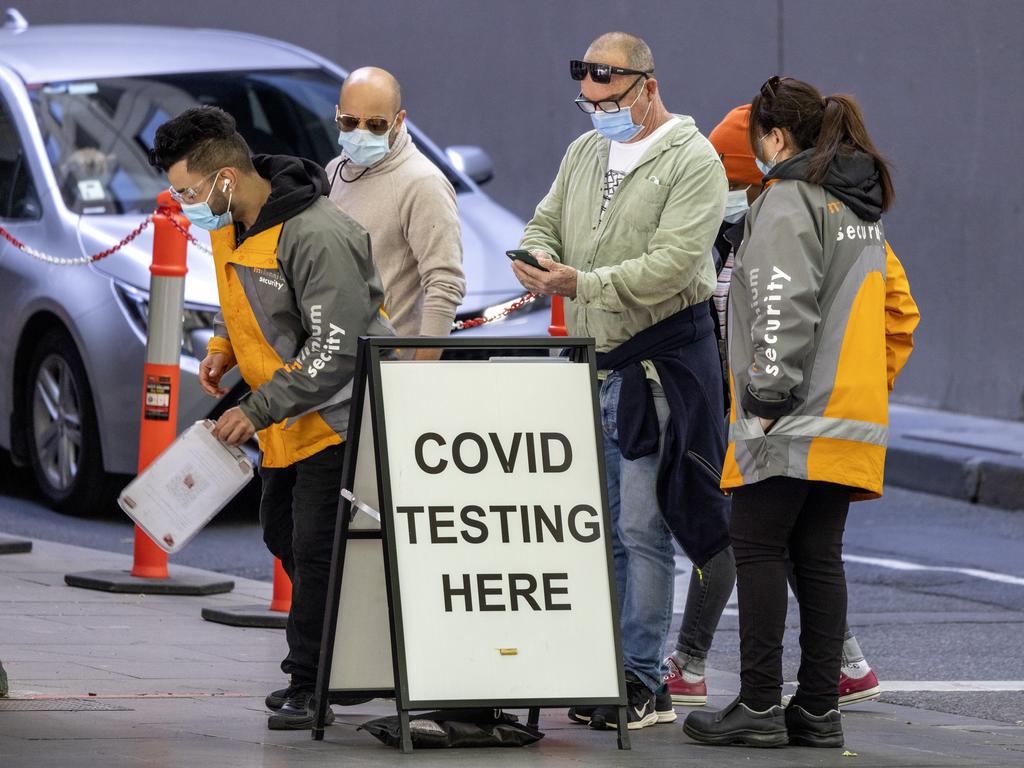 People queue for Covid testing in Bourke St in Melbourne’s CBD. Picture: NCA NewsWire / David Geraghty