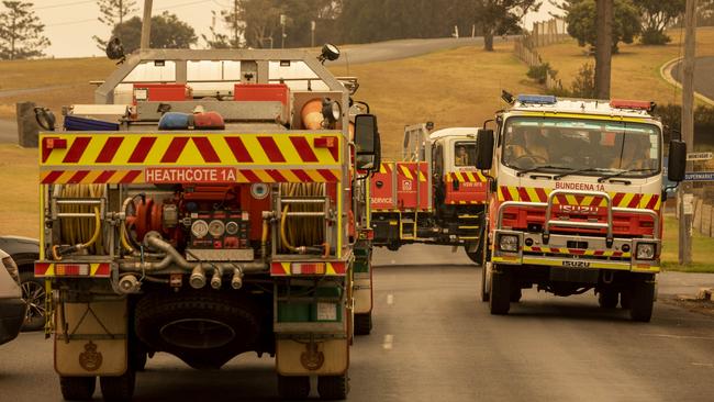 RFS Strike Force trucks from southern Sydney arrive in Bermagui. Picture: Sean Davey