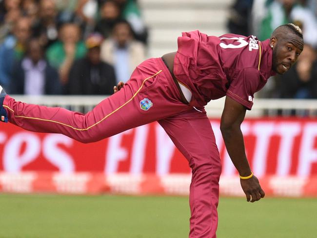 West Indies' Andre Russell bowls during the 2019 Cricket World Cup group stage match between West Indies and Pakistan at Trent Bridge in Nottingham, central England, on May 31, 2019. (Photo by Oli SCARFF / AFP) / RESTRICTED TO EDITORIAL USE