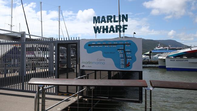 Queensland Ambulance crews at the police were called to the Cairns Marlin Marina yesterday after a snorkeller died at a reef off Cairns. PICTURE: BRENDAN RADKE