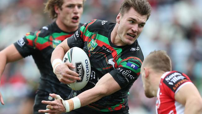 Angus Crichton on his way to scoring a try for the Rabbitohs. Picture: Brett Costello