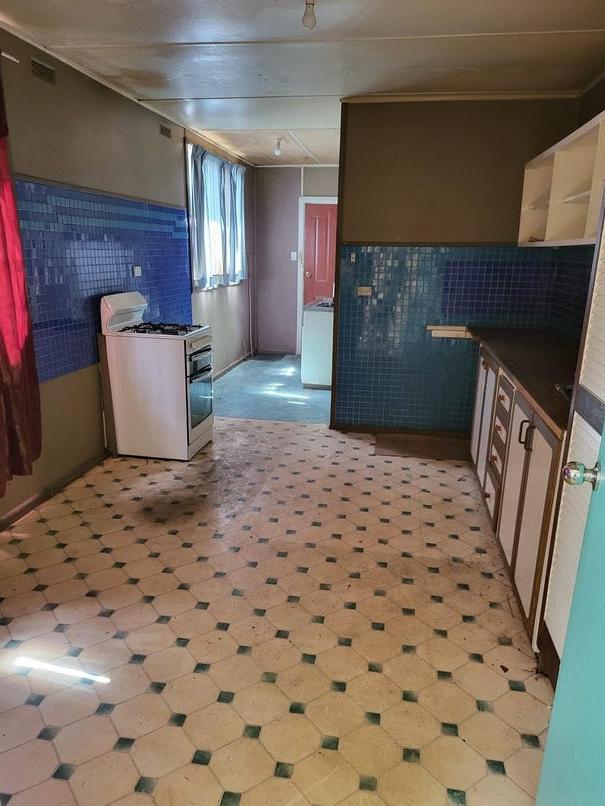 The kitchen space is also looking worn down. Picture: realestate.com