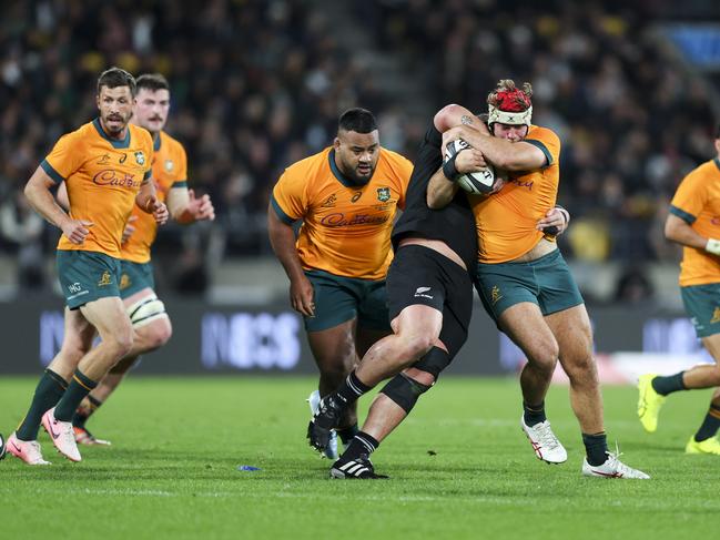 WELLINGTON, NEW ZEALAND - SEPTEMBER 28: Fraser McReight of Australia is tackled during The Rugby Championship &amp; Bledisloe Cup match between New Zealand All Blacks and Australia Wallabies at Sky Stadium on September 28, 2024 in Wellington, New Zealand. (Photo by Hagen Hopkins/Getty Images)