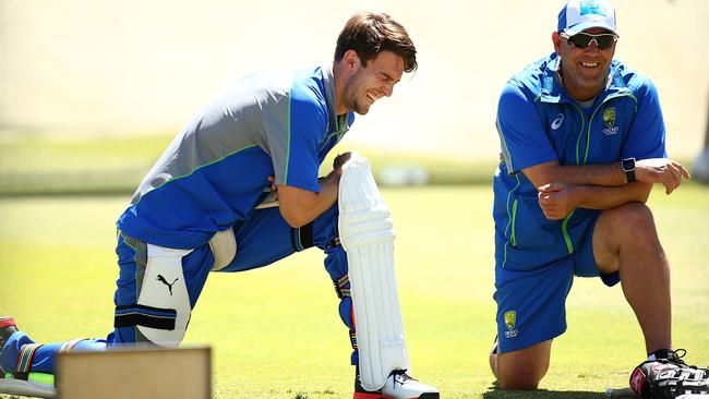 Mitch Marsh has a laugh with coach Darren Lehmann.
