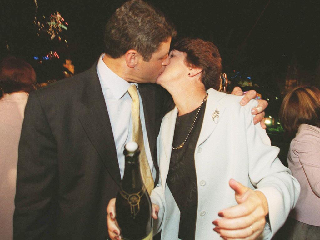 Steve Bracks kissing his wife Terry on New Years Eve 1999. Photo: Courier Mail archives