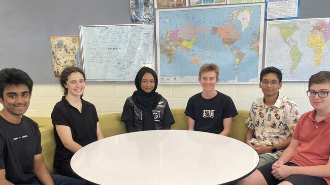 TAS graduates Shanid Aslam, Tenielle Massey, Atilia Mohd Azlan Shah, Murray Colbridge, Mohak Sengupta and Xavier Manea were excited to get their ATAR results on Friday morning. Picture: Andreas Nicola