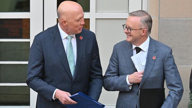 Peter Dutton, left, and Anthony Albanese attend the Last Post Ceremony at the Australian War Memorial in Canberra on Monday. Picture: AAP