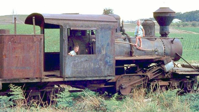 Russell (right), about 4, and Andrew, about 6, pictured about 1963 on the derelict Climax 1694. Picture: Don Wheatland/Puffing Billy Preservation Society