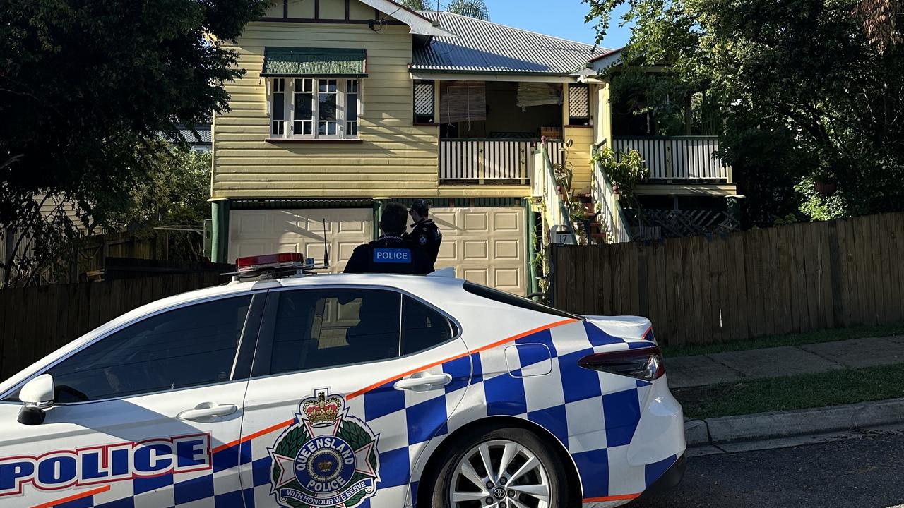 Police at a house in Annerley where it's alleged pipe bombs were detonated.