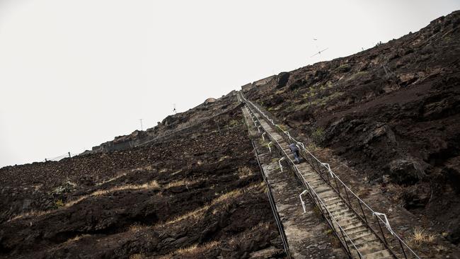 <s1>A man climbs the 699 steps of Jacob's ladder in Jamestown, St Helena’s capital. </s1>                        <source>Pictures: AFP PHOTOS</source>                                             <source/>