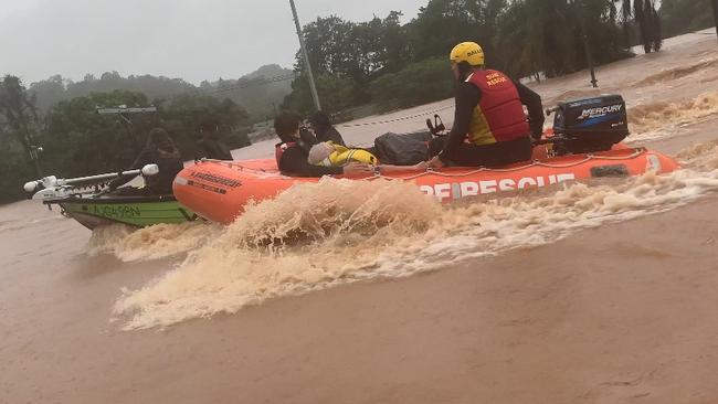 A rescue boat travels down Ballina St in South Lismore on February 28, 2022.