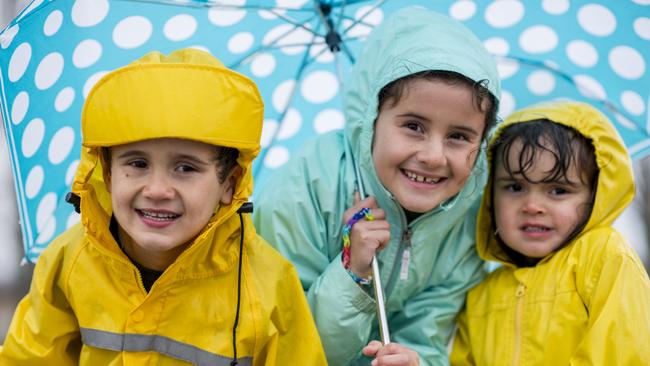 The welcome sight, sound and smell of rain greeted Darwin residents this morning