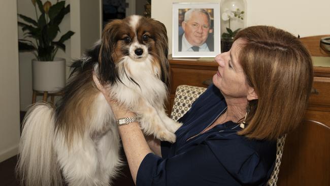 Tim loved his dog Mac, who is held by Erin Mulherin. Picture: Michaela Harlow