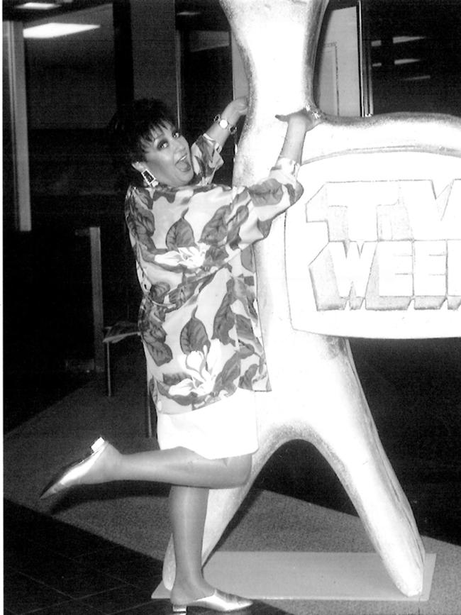 1995: Wills who has won a record 19 Logies hugs a giant Logie award, April, 1995.