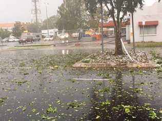 A storm last December brought heavy rain and hail as these images at Coles Grafton show. Picture: Bill North