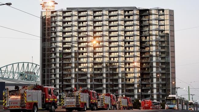 Hundreds of people were evacuated after a fire broke out in a Docklands Apartment building on Latrobe street, Docklands. The residents were moved to Southern Cross station. It appears to have started on a balcony. Picture: Nicole Garmston