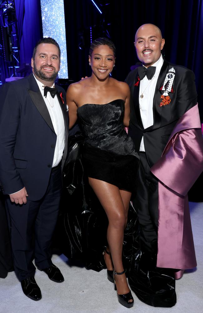 From left, Mike Vivier, Tiffany Haddish and John-Paul Ricchio attend the Elton John AIDS Foundation's 32nd Annual Academy Awards Viewing Party. Picture: Getty Images for Elton John AIDS Foundation