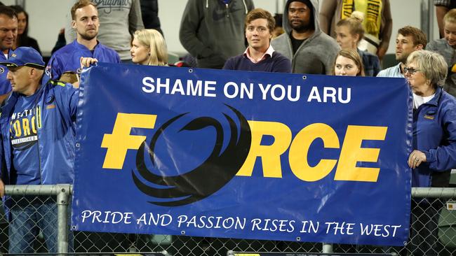 Force supporters hold a banner during a Rugby Championship match in Perth.