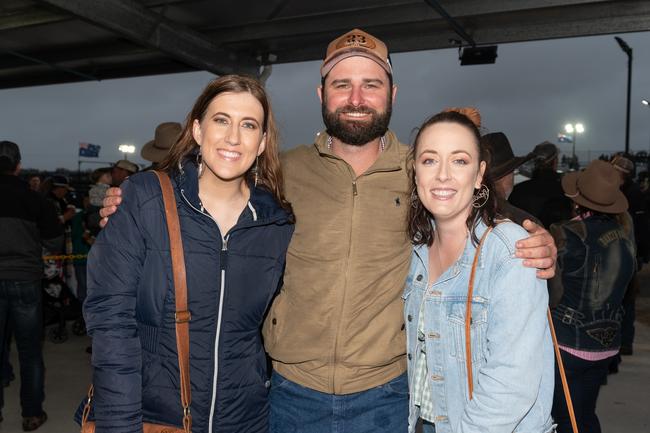 Anana Williams, Robert Brieffies and Sarah Nitz at the PBR Bull Pit Bull Bash at Dittmann Bucking Bulls in Bloomsbury. August 27, 2022. Picture: Michaela Harlow