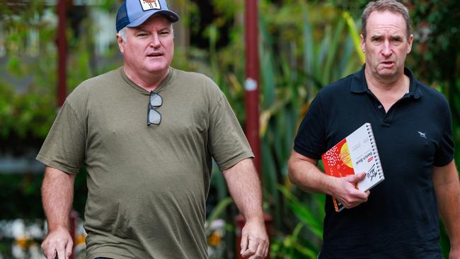 Embattled cricketer Stuart MacGill, left, was making the most of his days before his sentence hearing next month enjoying a coffee meeting on the Lower North Shore. Picture: Justin Lloyd.