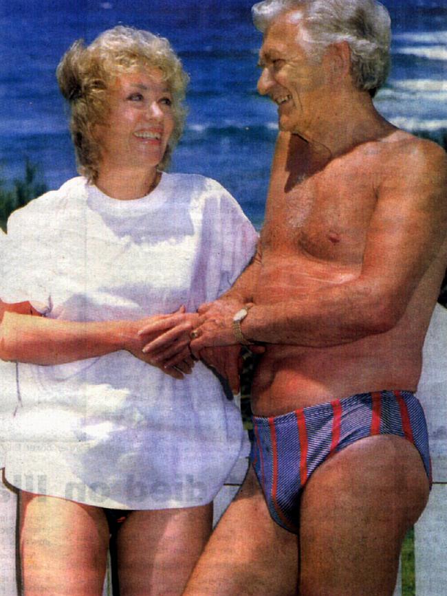 The couple in their famous beach photo at Berrara. Picture: Illawarra Mercury