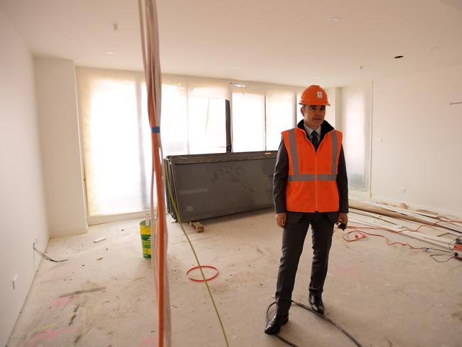 Developer Michael D'Elboux in one of the apartments still taking shape. (AAPImage/Tracey Nearmy)