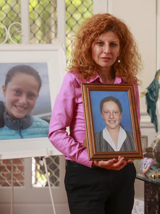 Bridget Sakr with pictures of 11-year-old Veronique. Picture: Justin Lloyd