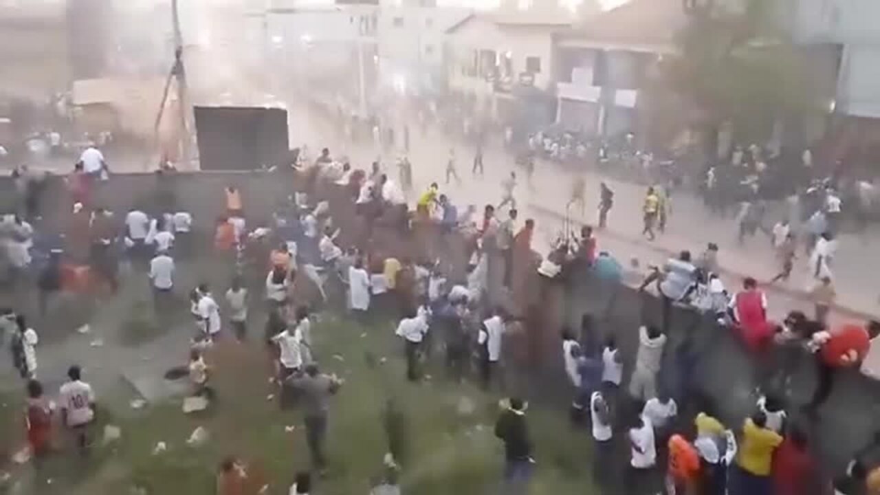 Video shows scores climbing Guinea stadium walls to escape crush