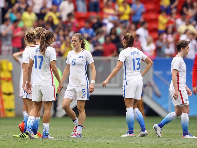 The United States team reacts after their loss to Sweden.