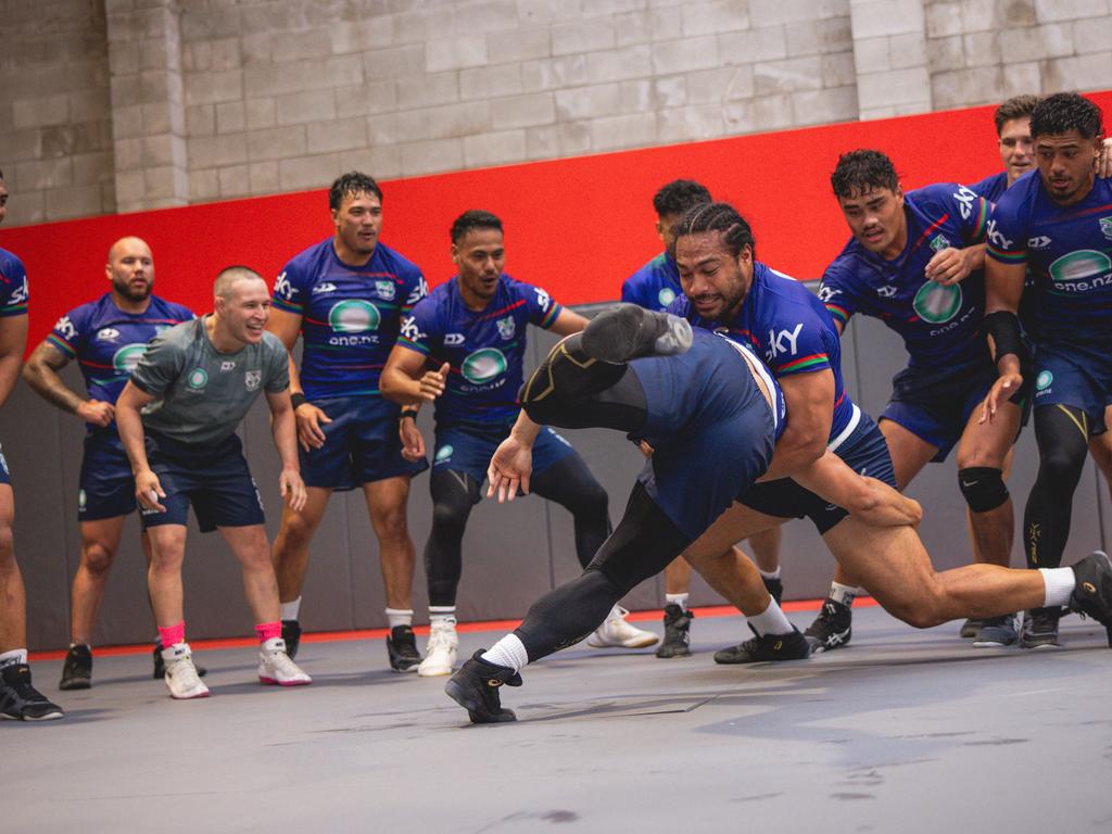 Kara-France (grey shirt) takes a wrestling session with the Warriors. Picture: Supplied