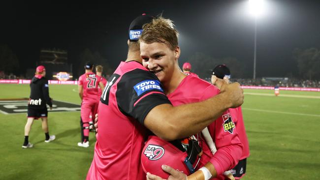 Remember hugging at the cricket? The Sixers put on a show last January when they came to C.ex Stadium in Coffs Harbour. Photo: Jason O'Brien / AAP