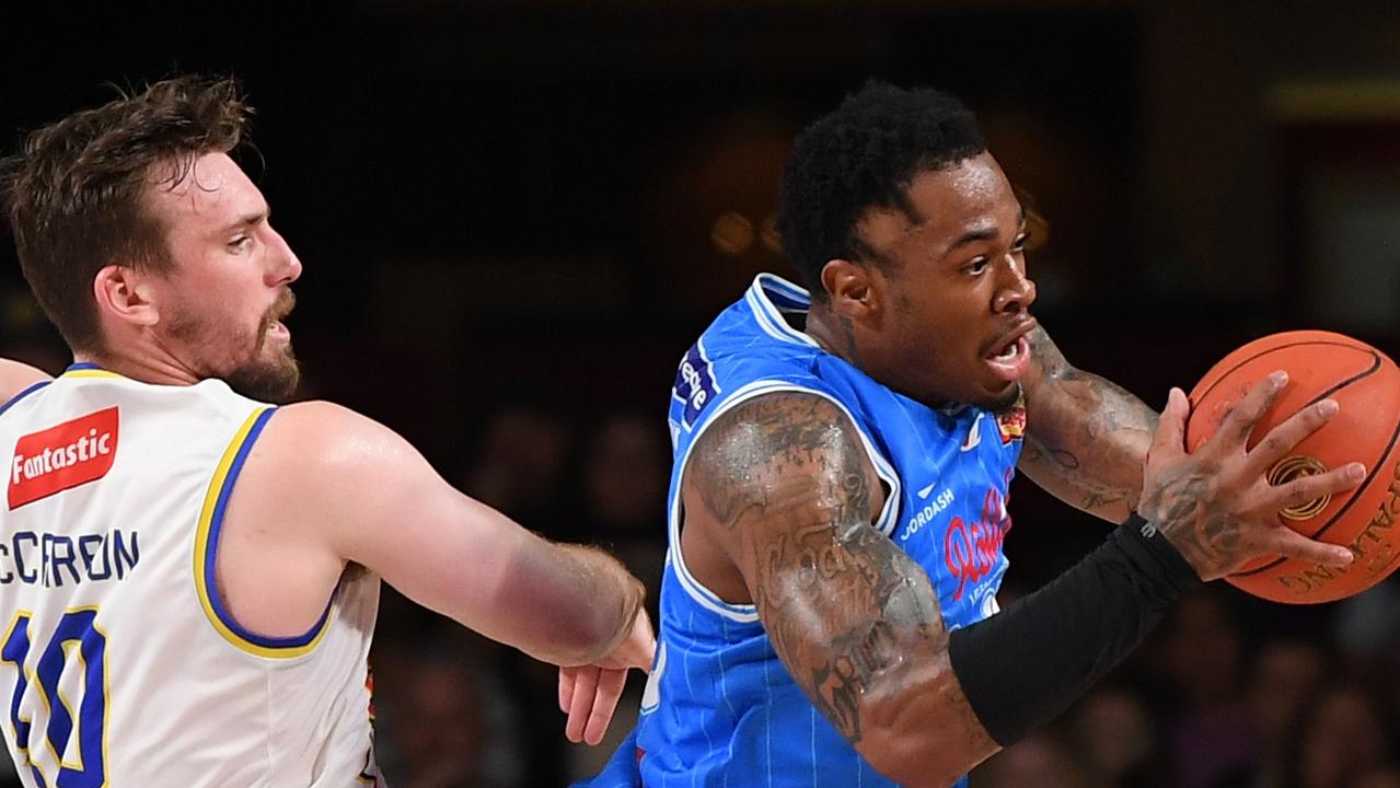 Rayon Tucker rebounds in front of Mitch McCarron the last time United and the 36ers met. Picture: Mark Brake/Getty Images