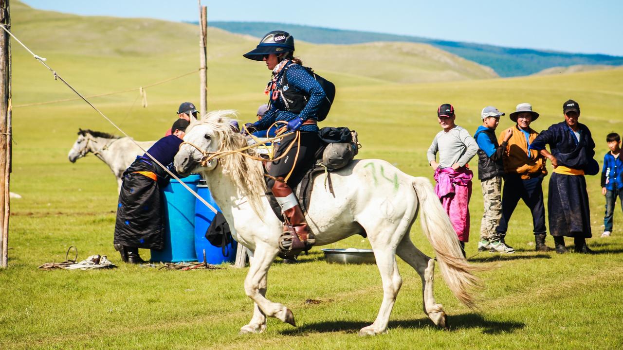 Dumplings and feral horses: Qld rider finishes world’s longest race