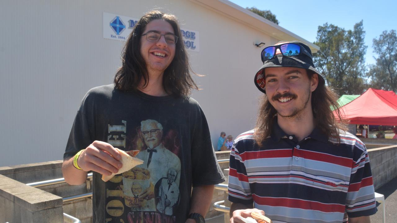 Enjoying a democracy snag at Middle Ridge State School, Toowoomba are (from left) Adam O'Brien and Jessie Bateman. October 14, 2023.