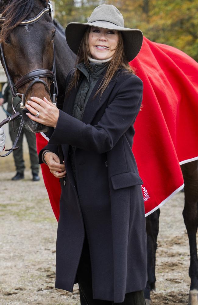 Queen Mary of Denmark and the winning horse at the Hubertusjagt Drag Hunting Event In Dyrehaven on November 3, 2024 in Klampenborg, Denmark. Picture: Martin Sylvest Andersen/Getty Images