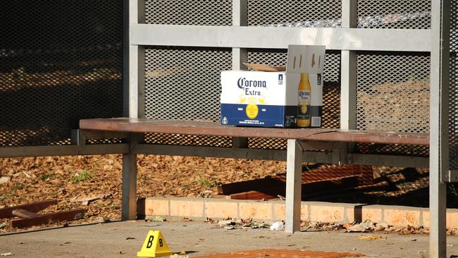 A slab of beer atop a bench near where the man died. Picture: Tim Hunter