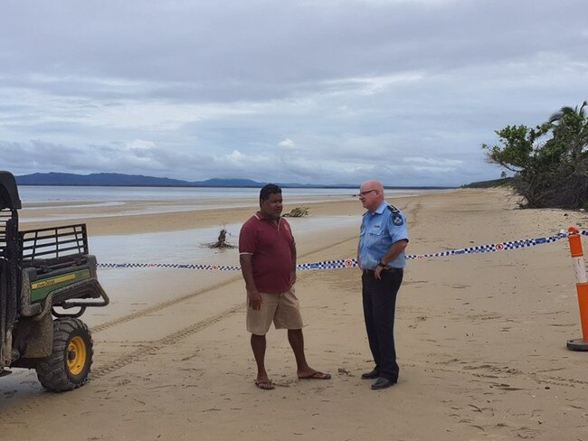 Lockhart River Mayor Wayne Butcher and Cape York police inspector Mark Henderson (inset above) at the scene of the tragedy.