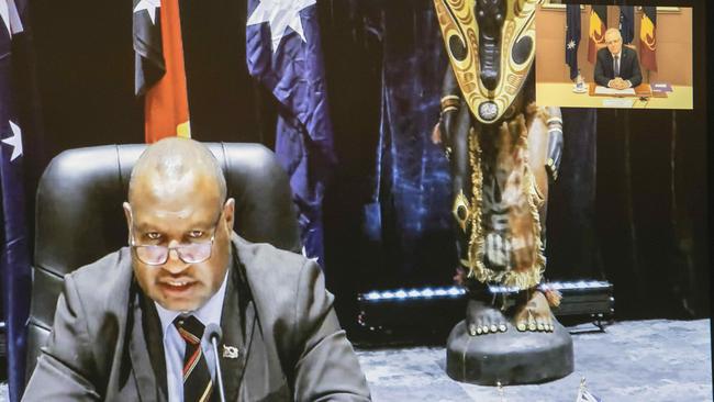 The virtual summit between Scott Morrison and Papua New Guinea Prime Minister James Marape, left. Picture: Gary Ramage