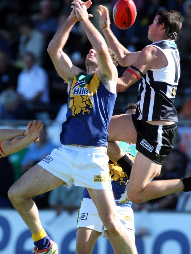 Jordan Barham (right) playing for Port Adelaide in the SANFL.