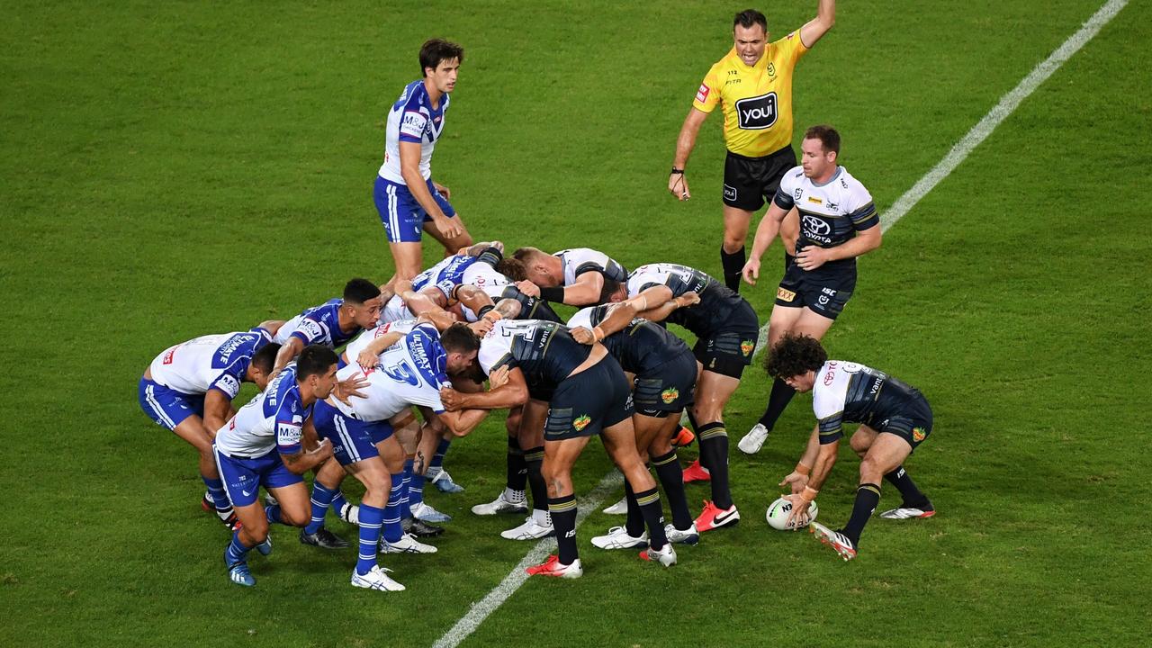 Bulldogs and Cowboys form a scrum.