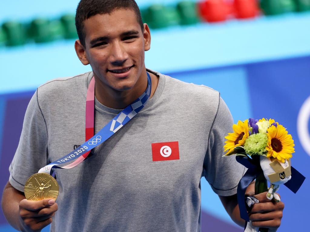 Ahmed Hafnaoui poses with his gold medal. Picture: David Ramos/Getty Images