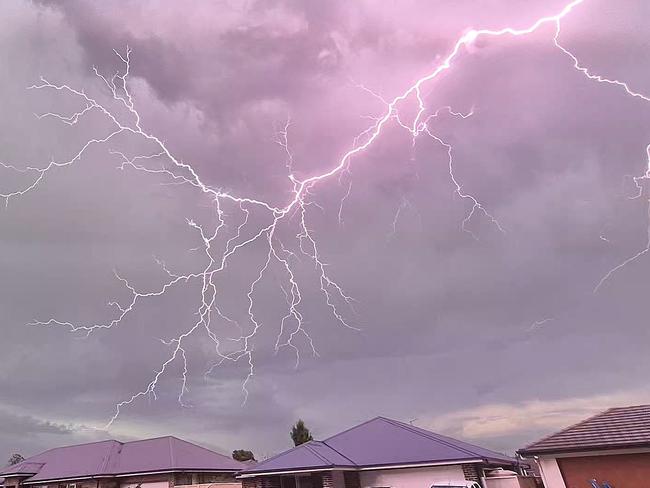 Lightning over Nattai Ponds in the NSW Southern Highlands. Picture: David Hofman ,